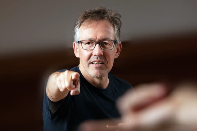 Fraser Trainer pointing at the camera.