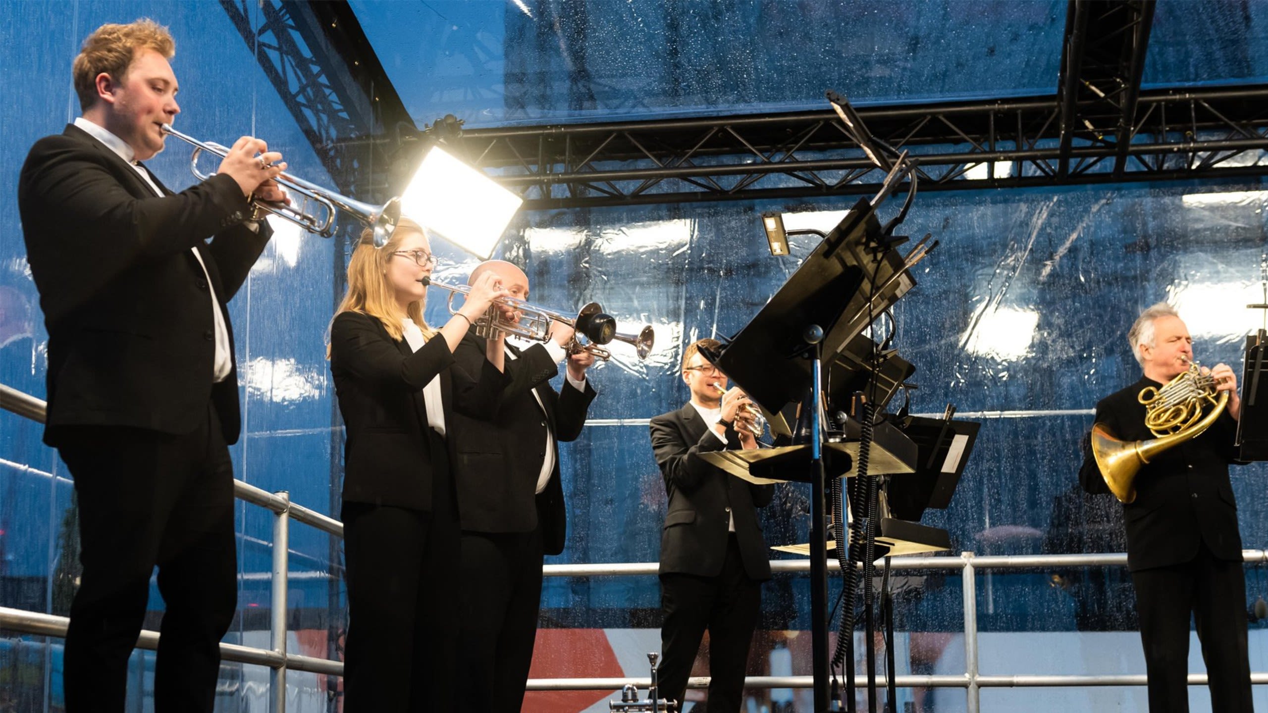 Brass Ensemble playing on outdoor stage